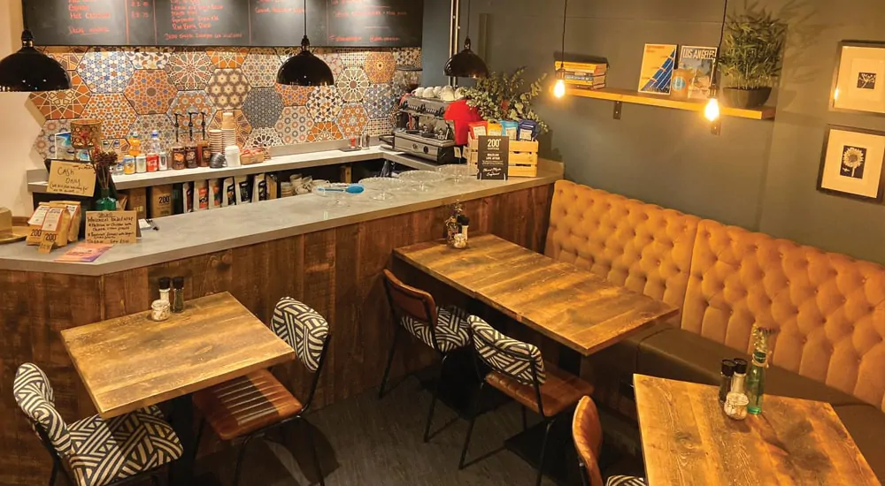 Albies cafe and loose fixed seating completed by Contract Furniture Group